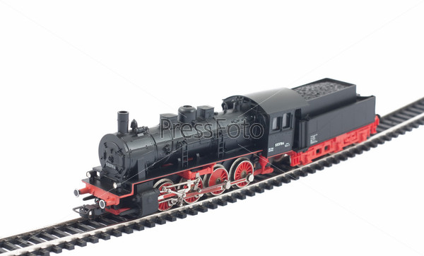 Toy steam locomotive on white background
