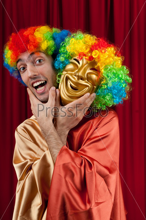 Actor with maks in a funny theater concept, stock photo