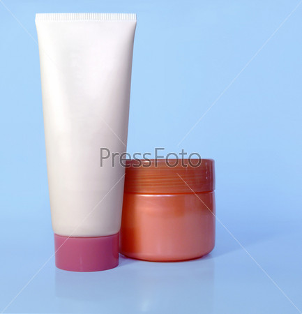 Cosmetic tube and pot of cream
