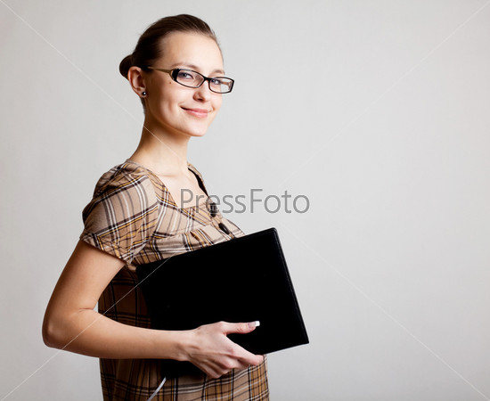 Portrait of a young woman, college student