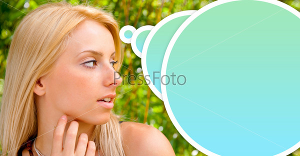 Face of the young beautiful sexy woman outdoors. Blank balloon with copyspace for your text and logo.