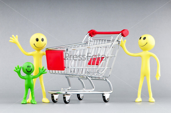 Happy family with shopping cart