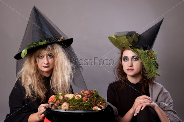 Women make up as witches for Halloween, in the studio,  halloween party, halloween costume, halloween witch, woman Halloween, scary halloween, spooky halloween image, vampire woman