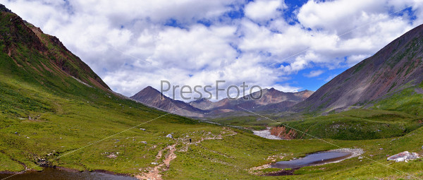 Tourist walking trail in the U-shaped trough Valley Echo-Ger. Eastern Sayan Mountains, stock photo