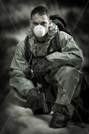Post apocalypses world halloween concept. Portrait of man in gas mask