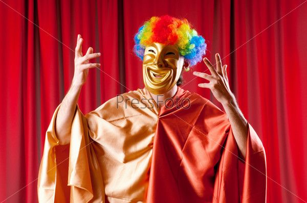 Theater concept with masked actor, stock photo