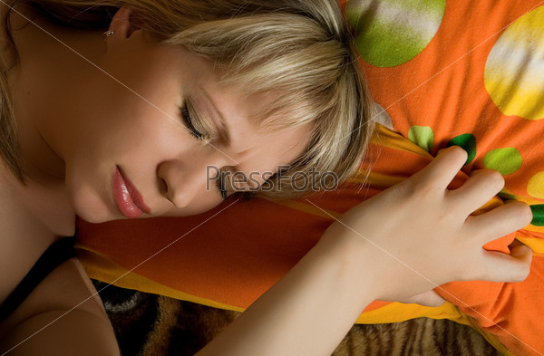 Sleeping pretty blonde caucasian woman, stock photo