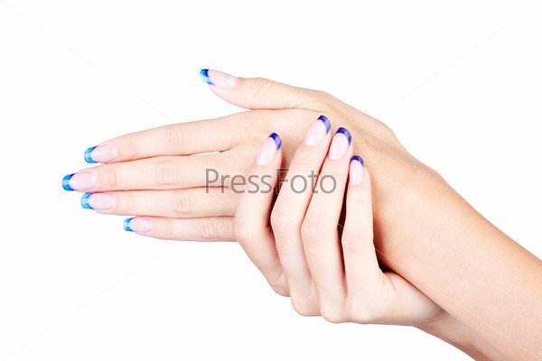 Hands with woman\'s professional blue french nails manicure\
isolated on white