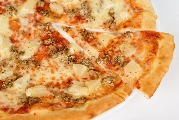 pizza closeup with roast chicken, pineapple, sesame, garlic and mozzarella cheese
