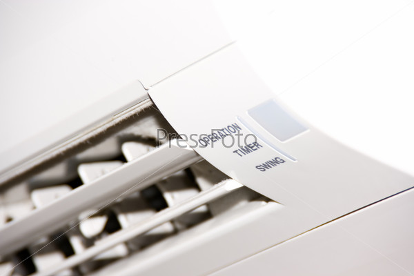 White air-conditioner unit inside block set, stock photo