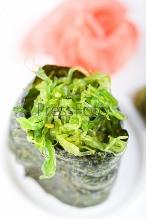 Japanese fresh maki sushi with green seaweed