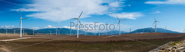 Windmills in summer landscape of Andalucia, Spain, Europe