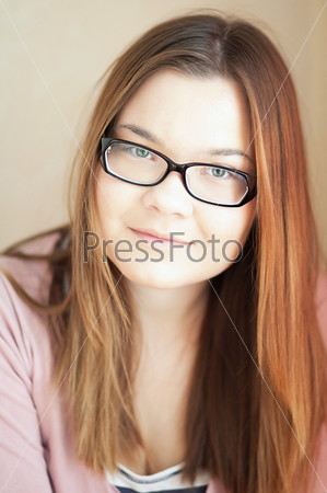 Black-rimmed glasses on the girl.