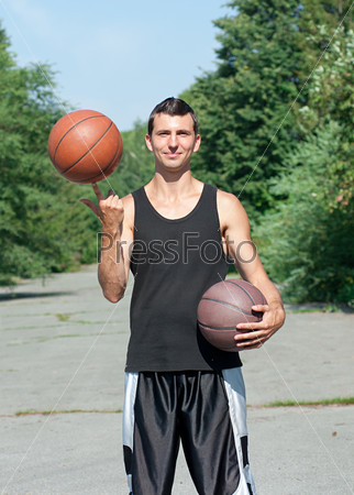 Young basketball player with ball