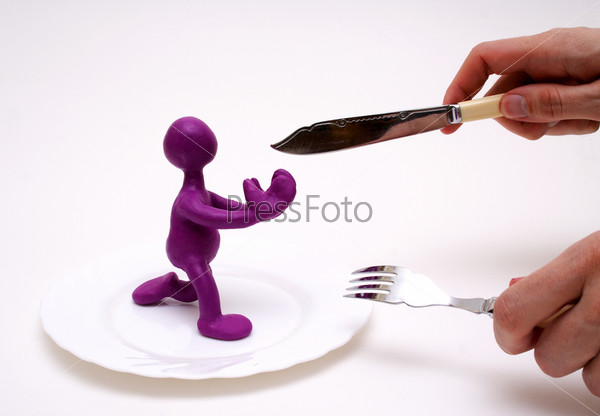 Purple puppet of plasticine begging for life