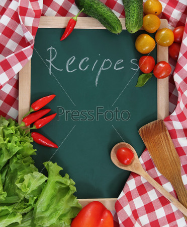 Vegetables still life with recipes blank on checkered background