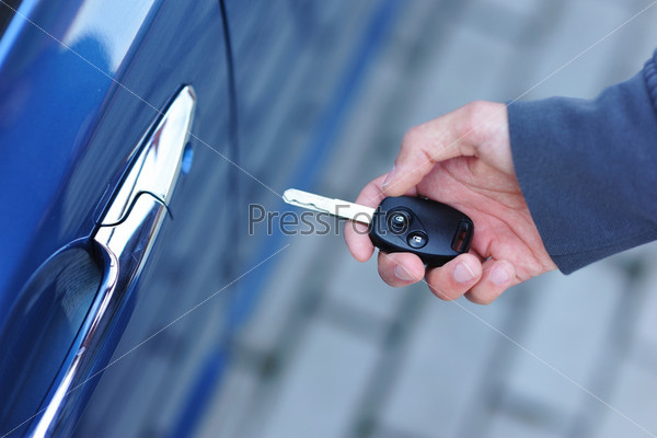 Car key in man\'s hand