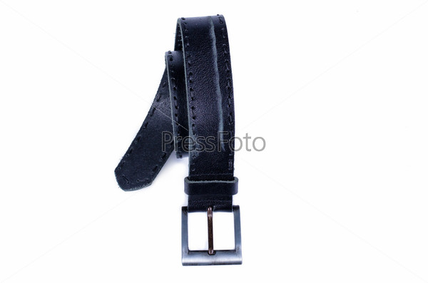 The curtailed old leather belt with a metal plaque separately