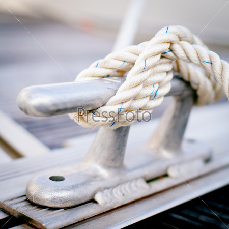 Steel anchor on boat or ship.