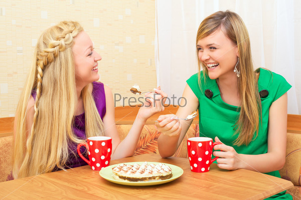 Girls Enjoying Tea and Cake