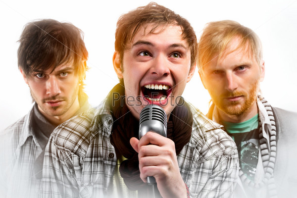 Portrait of three handsome musicians over white background