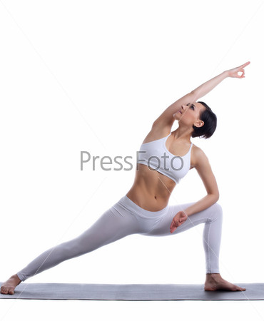 young woman training in yoga pose isolated
