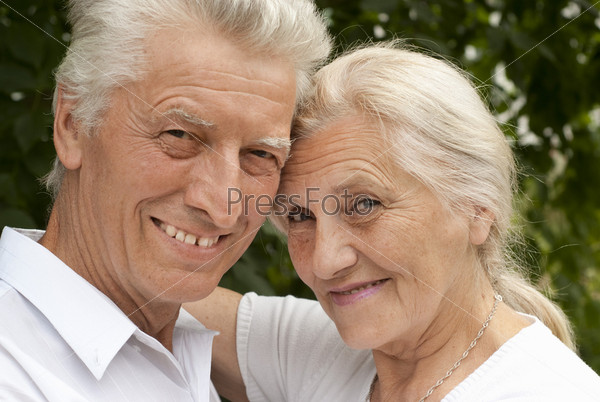 nice old couple in a summer park