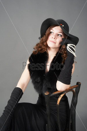 Pretty woman on chair