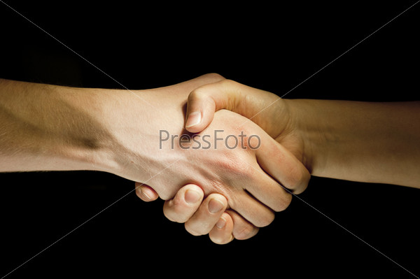 Lighted two hands unite with eachother as agreement
