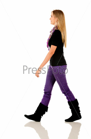 Casual woman walking - isolated over a white background