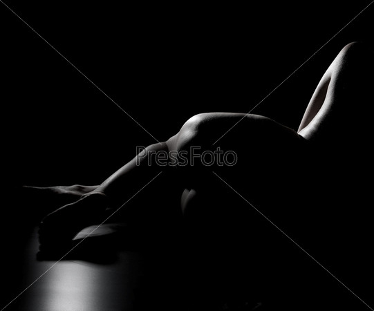 Contour-light photo of woman on black background