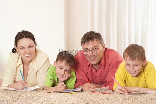 Family on the carpet, stock photo