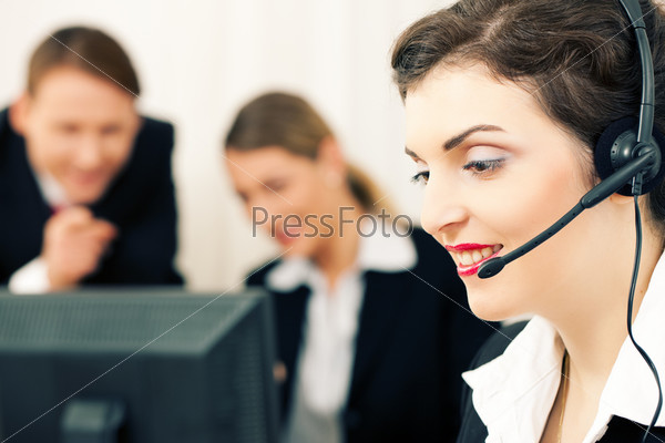 Business team with computer and headphone