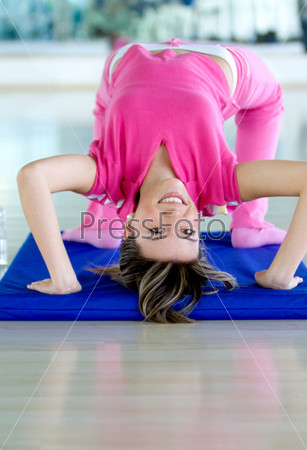 Gym girl bending backwards