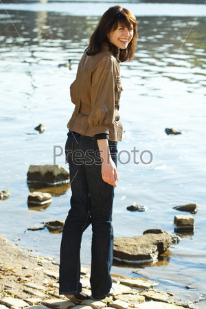 beautiful young woman at the river