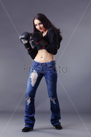 Portrait of young beautiful boxer woman