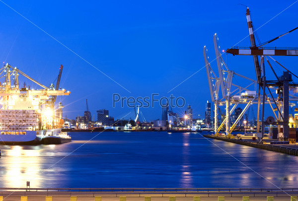 The skyline of Rotterdam, the Netherlands, lead in by a dock of the world\'s largest harbor