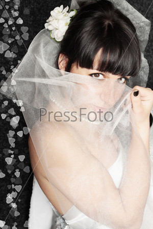 bride it covered face by the veil
