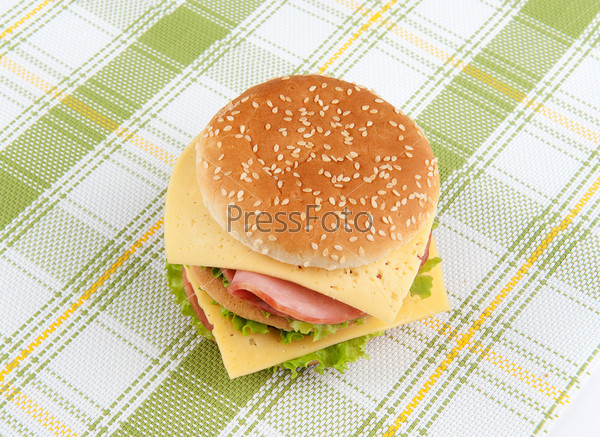 fast food sandwich with lettuce, ham and cheese