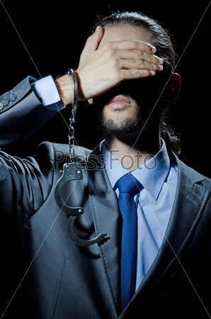 Businessman jailed for his crimes, stock photo