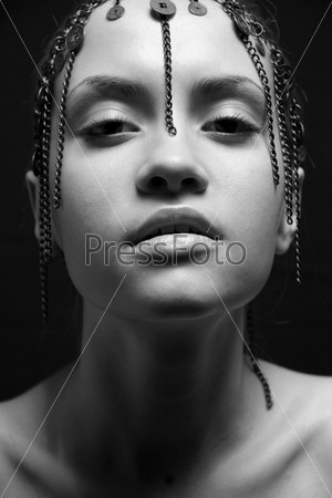 Young sensual woman with chain