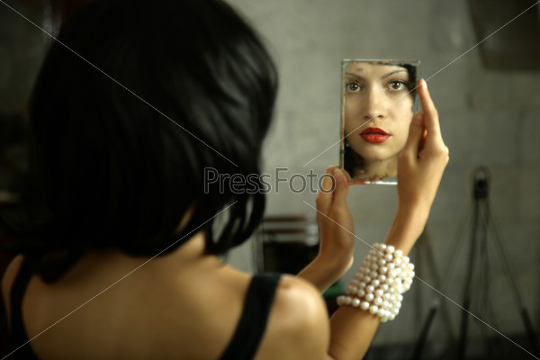 Young lady with mirror