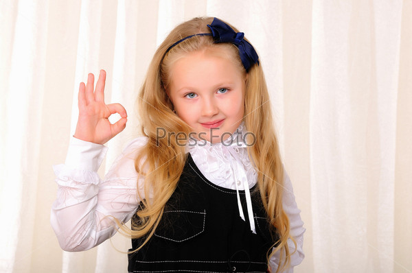 Portrait of a Young beautiful girl making hand gestures