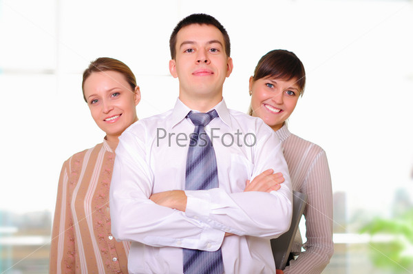 The team of young successful business people in the office workplace.