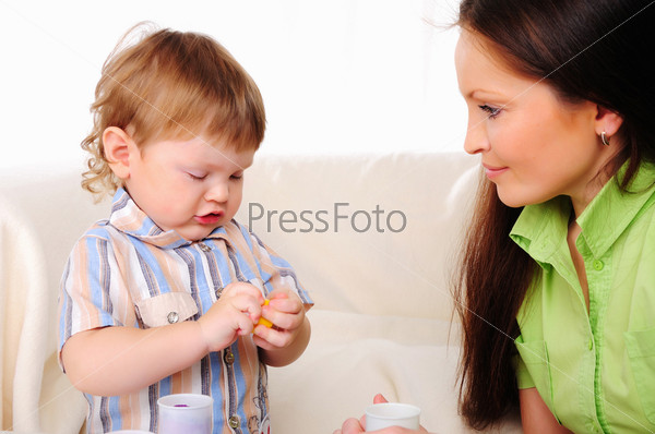 Mom and son having fun together Symbol of the family, stock photo