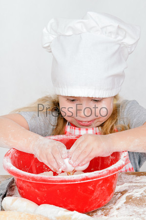Girl in chef s hat