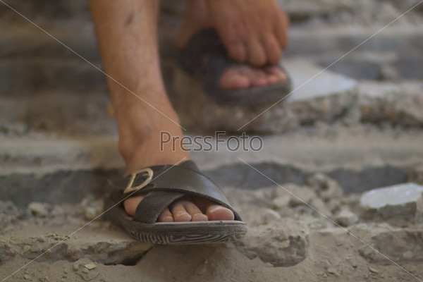 Feet in sandals