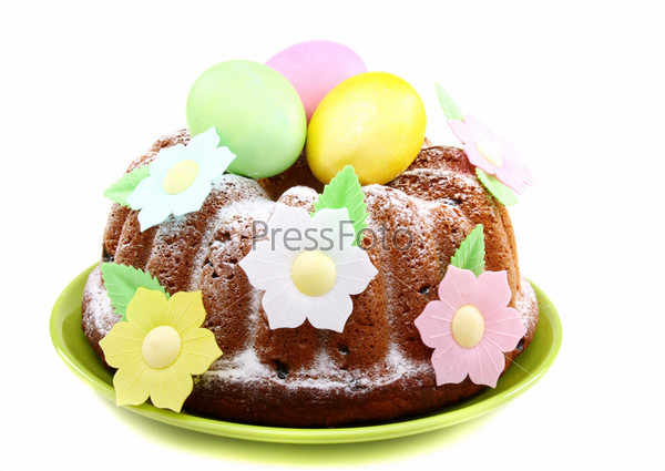 Easter cake decorated with flowers on a white background.