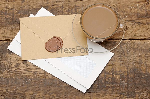 envelopes with wax seal on coffee table