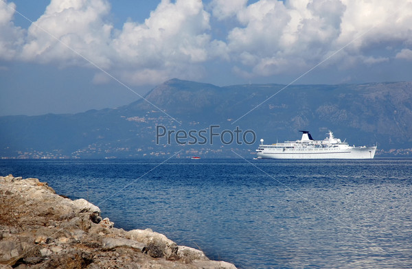 A cruise ship  at anchor in bay of Corfu.Greece